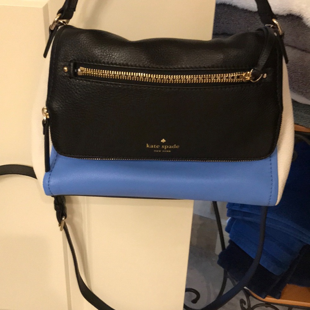Blue, white and black purse